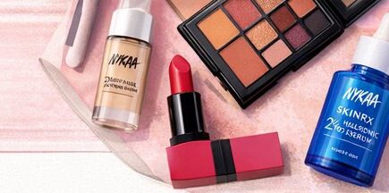 Nykaa SkinRx Hyaluronic Acid Serum bottle on pink background