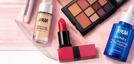 Nykaa SkinRx Hyaluronic Acid Serum bottle on pink background